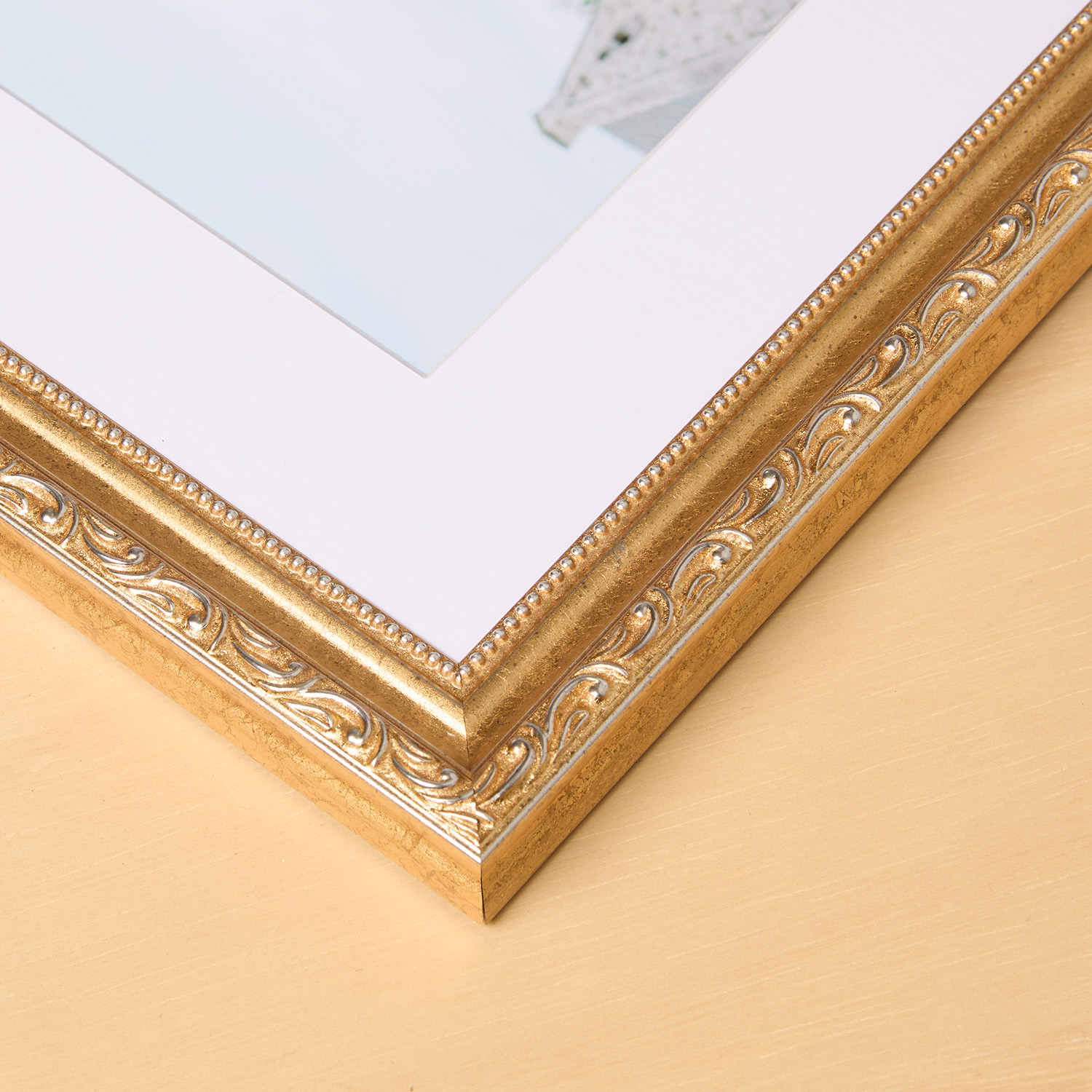 Ophelia Ornate Gold frame in a room setting